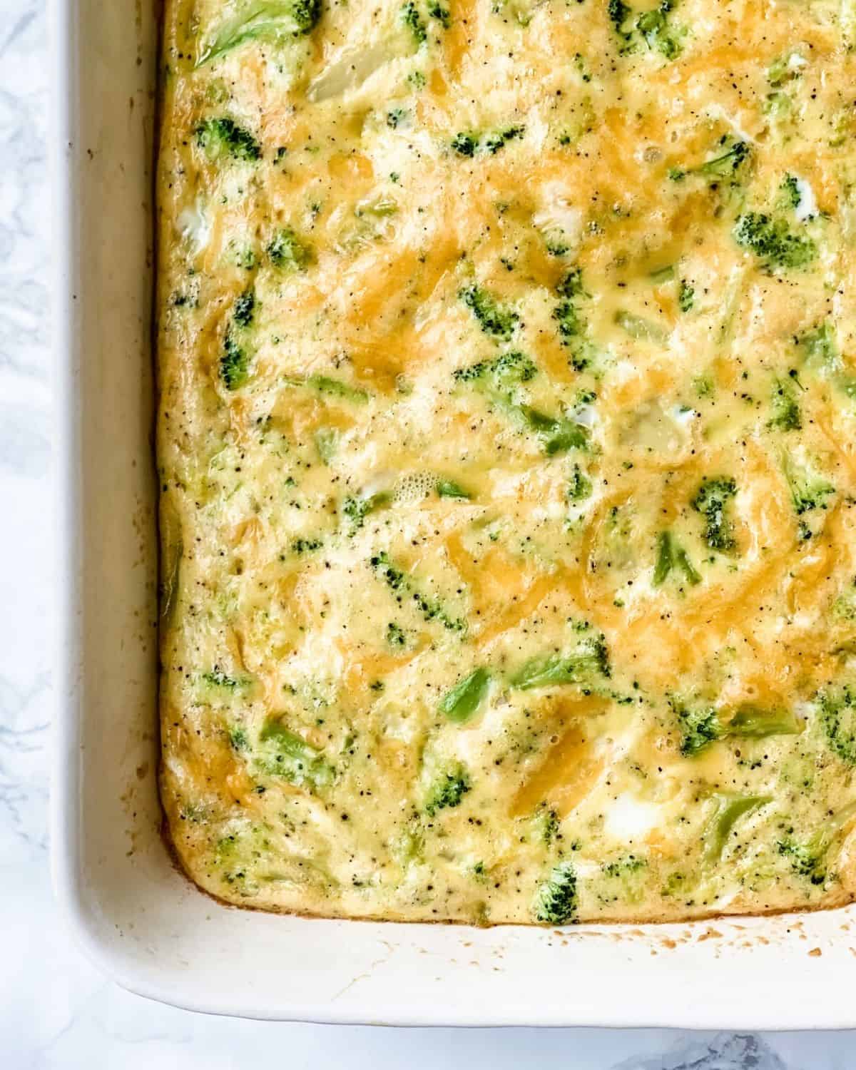 cheese and broccoli egg bake cooked in a casserole dish