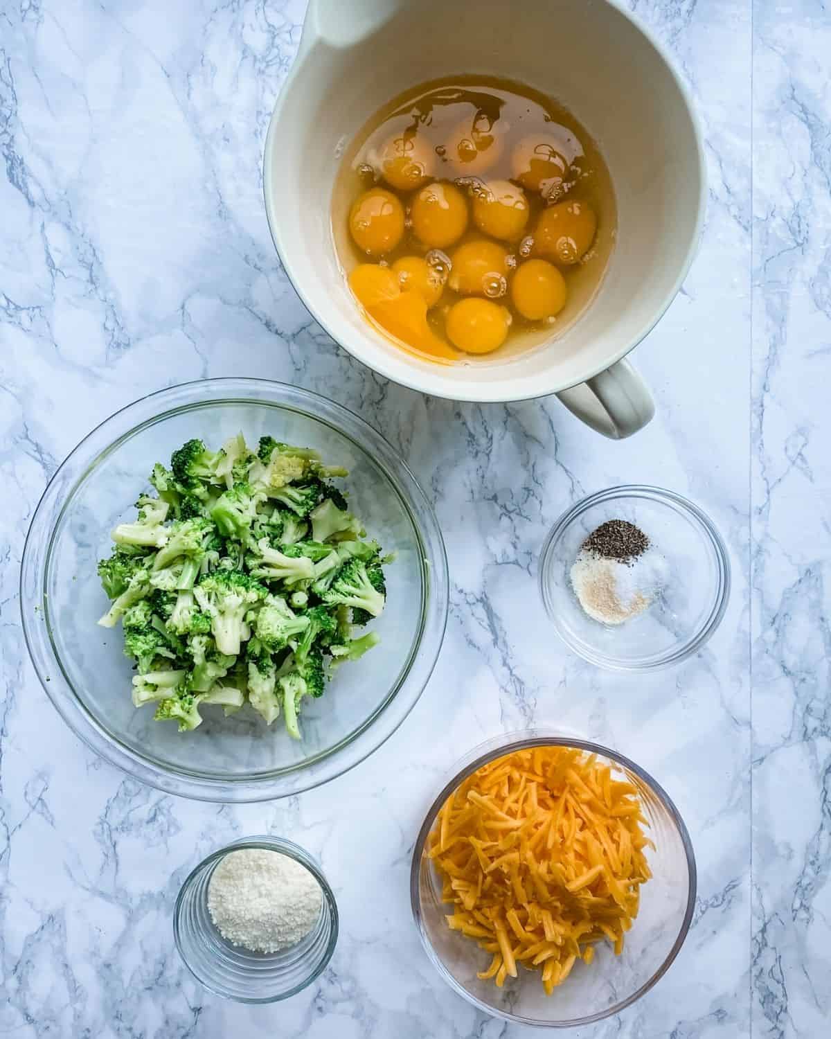 ingredients to make a broccoli egg baked with cheddar cheese.