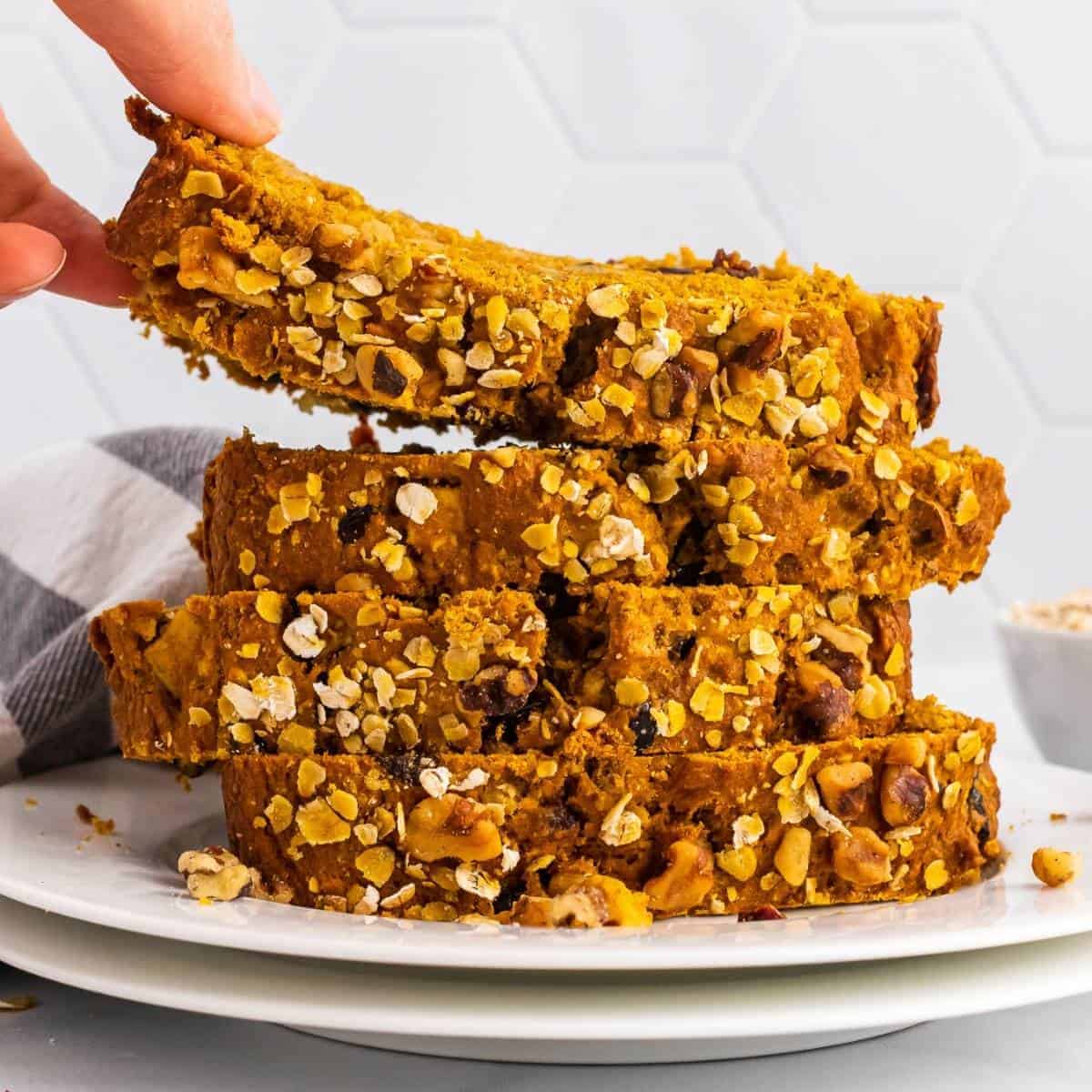 pumpkin apple bread recipe to make this fall. Slices layered on top of one another.