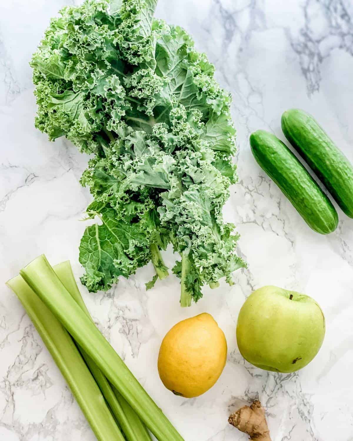 ingredients for making homemade green juice in a blender