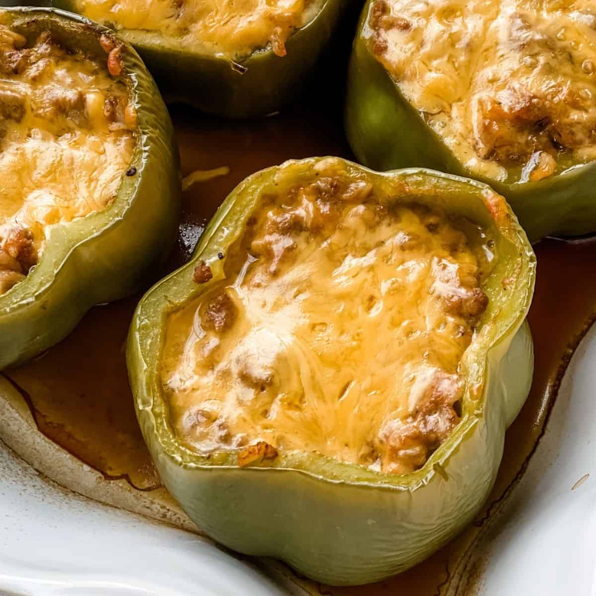 delicious cheeseburger stuffed peppers in a baking dish