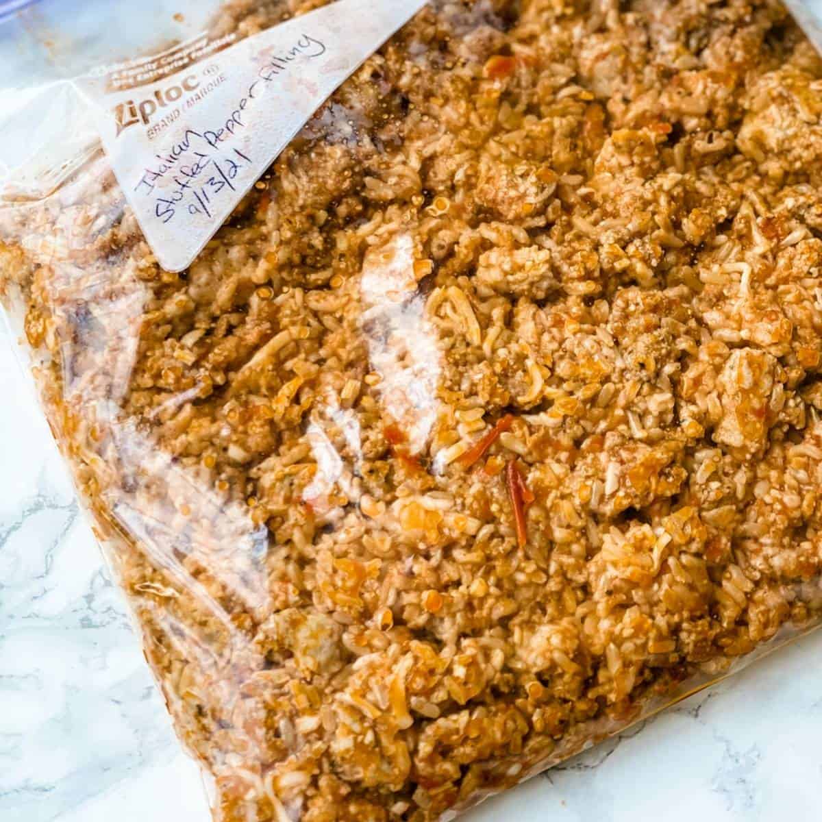 stuffed pepper filling in a freezer bag that is flatten out to make room in the freezer.