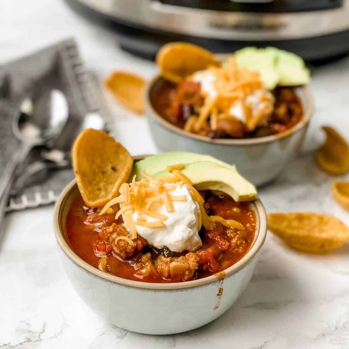 Italian sausage chili made in the crockpot.