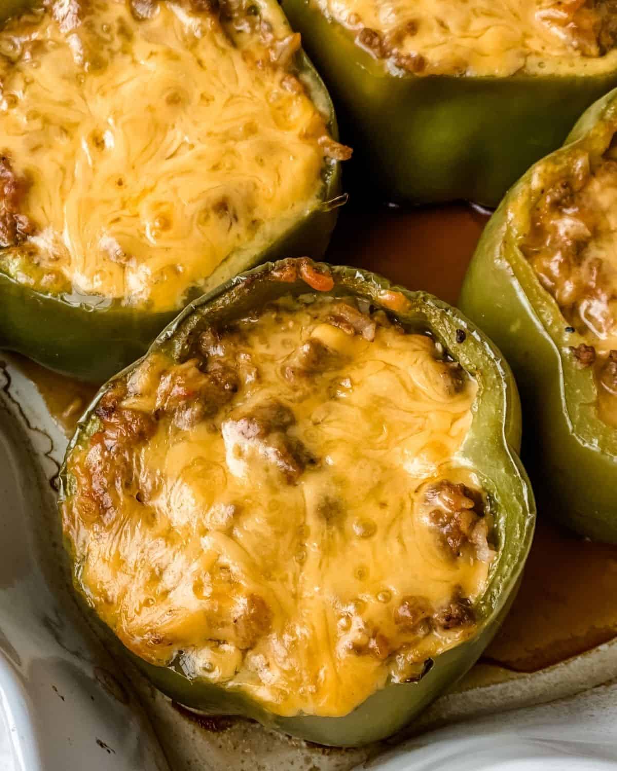 close-up picture of stuffed cheeseburger peppers.