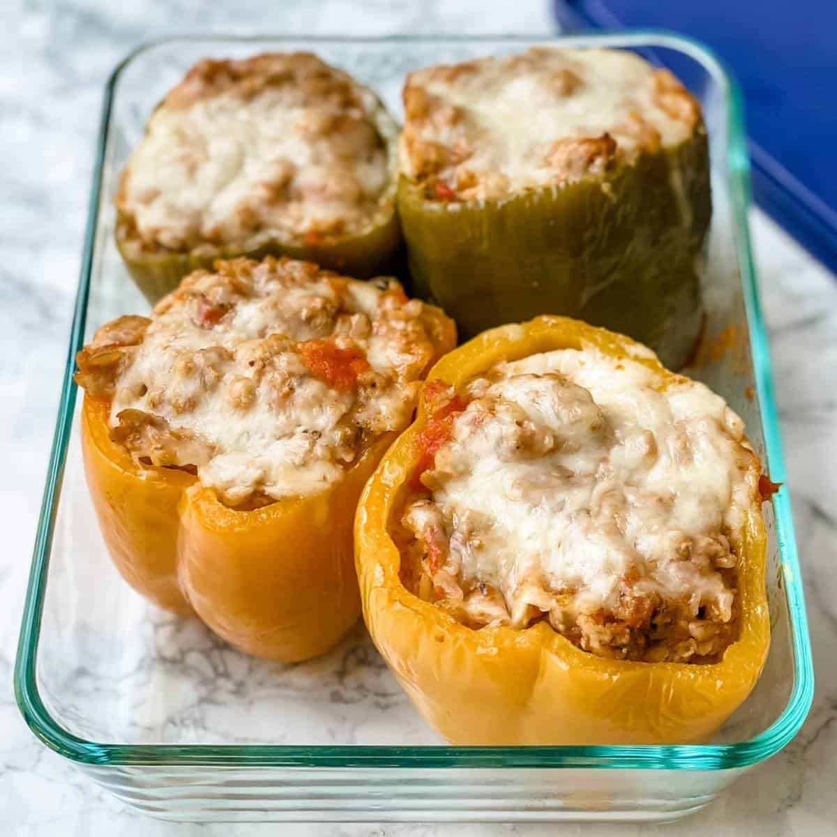 stuffed peppers in a glass container