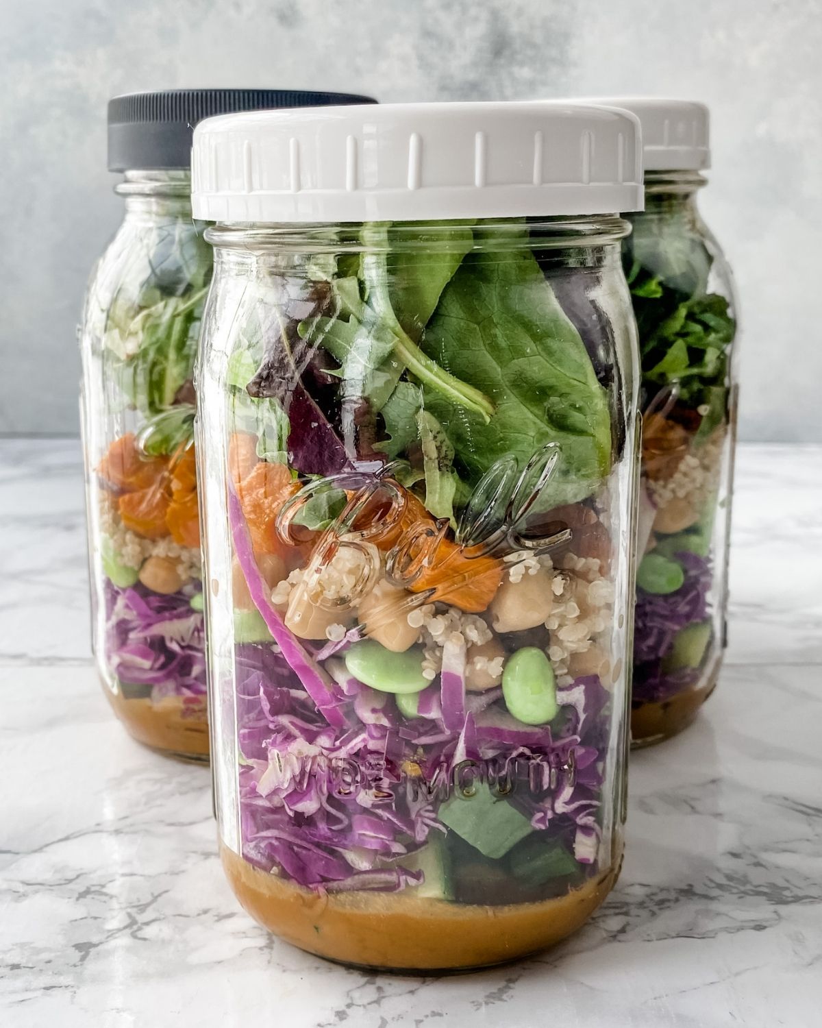 spicy thai salad in a mason jar with lid.