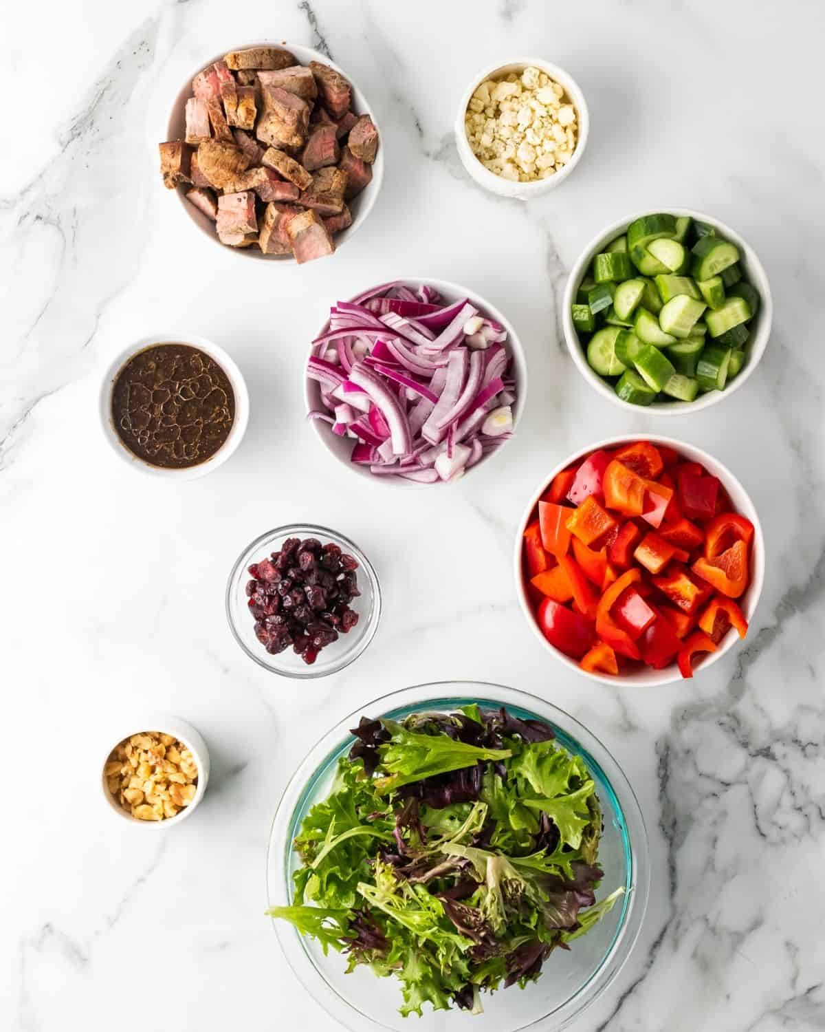 ingredients to make steak salad in a jar