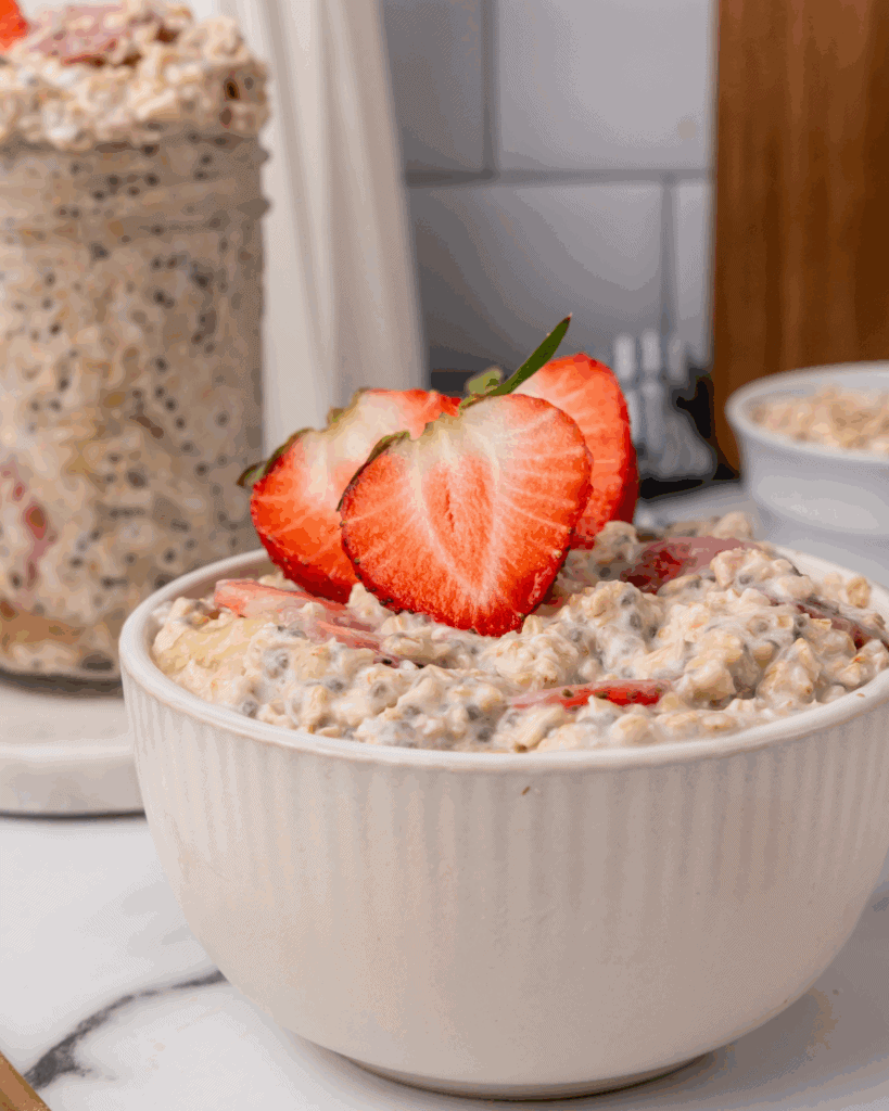overnight oats in a bowl with strawberries.