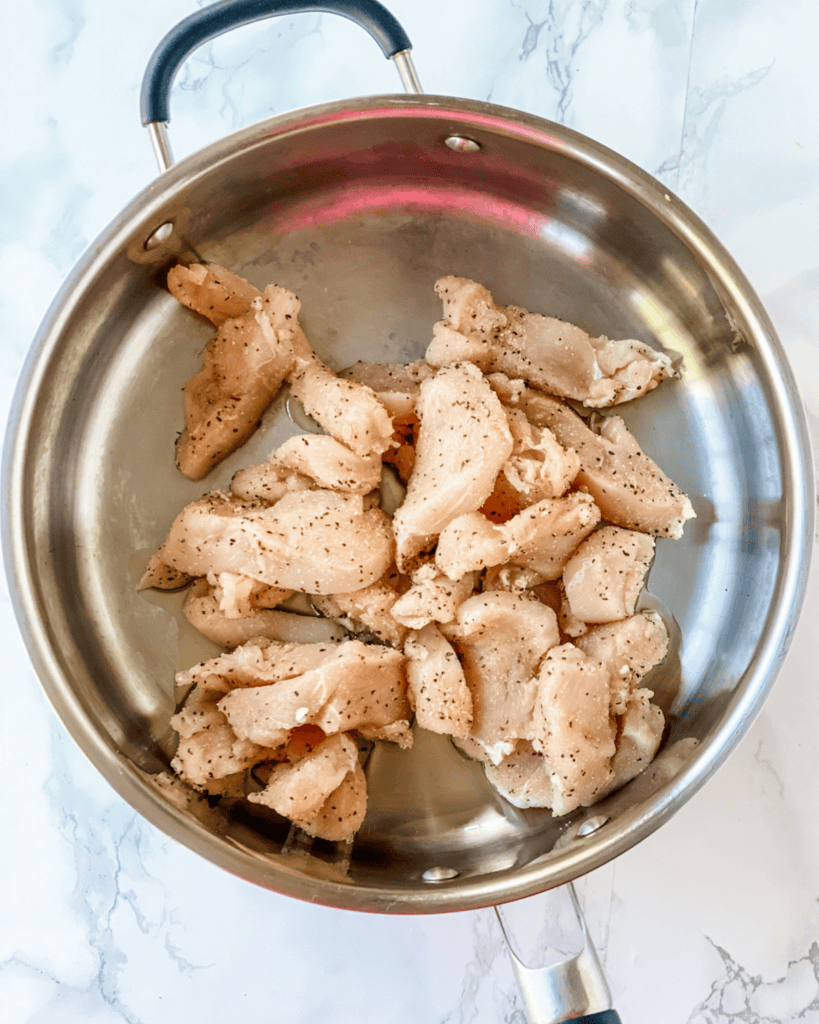 Chicken being cooked in the pan