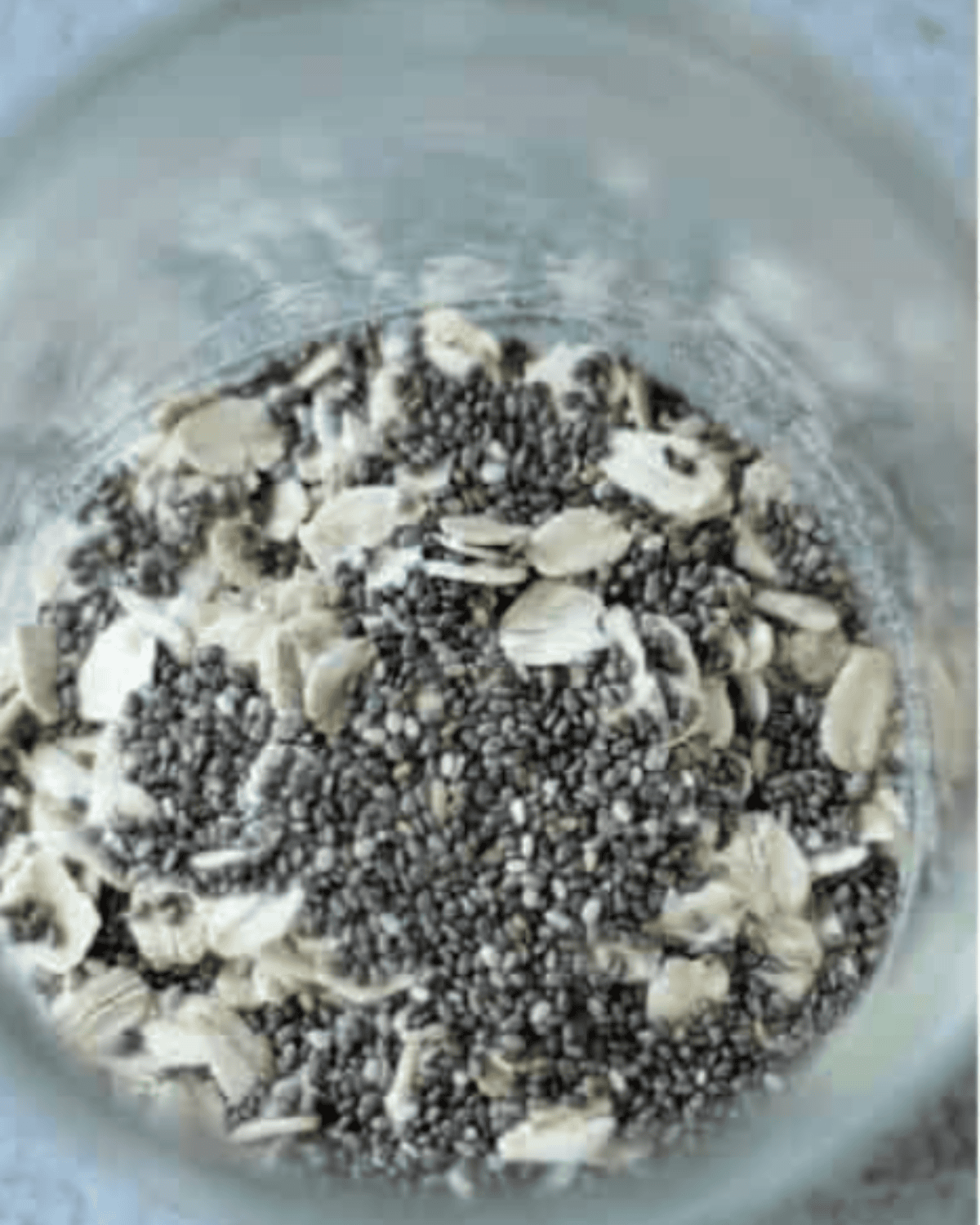 rolled oats and chia seeds in a mason jar