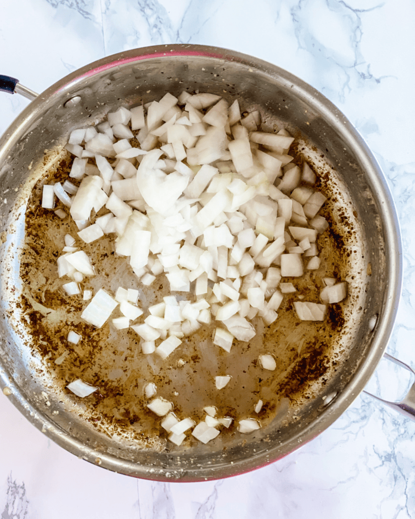Onions being cooked in the pan
