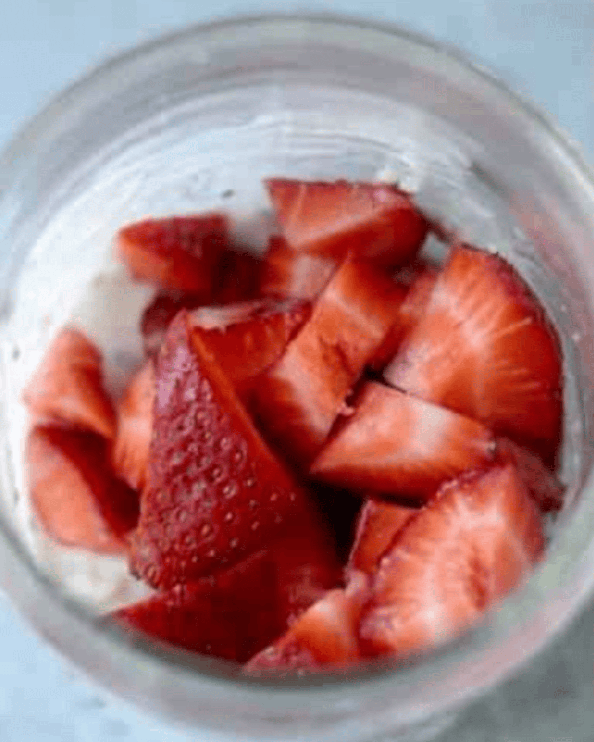strawberries on top of the rolled outs and yogurt and milk.