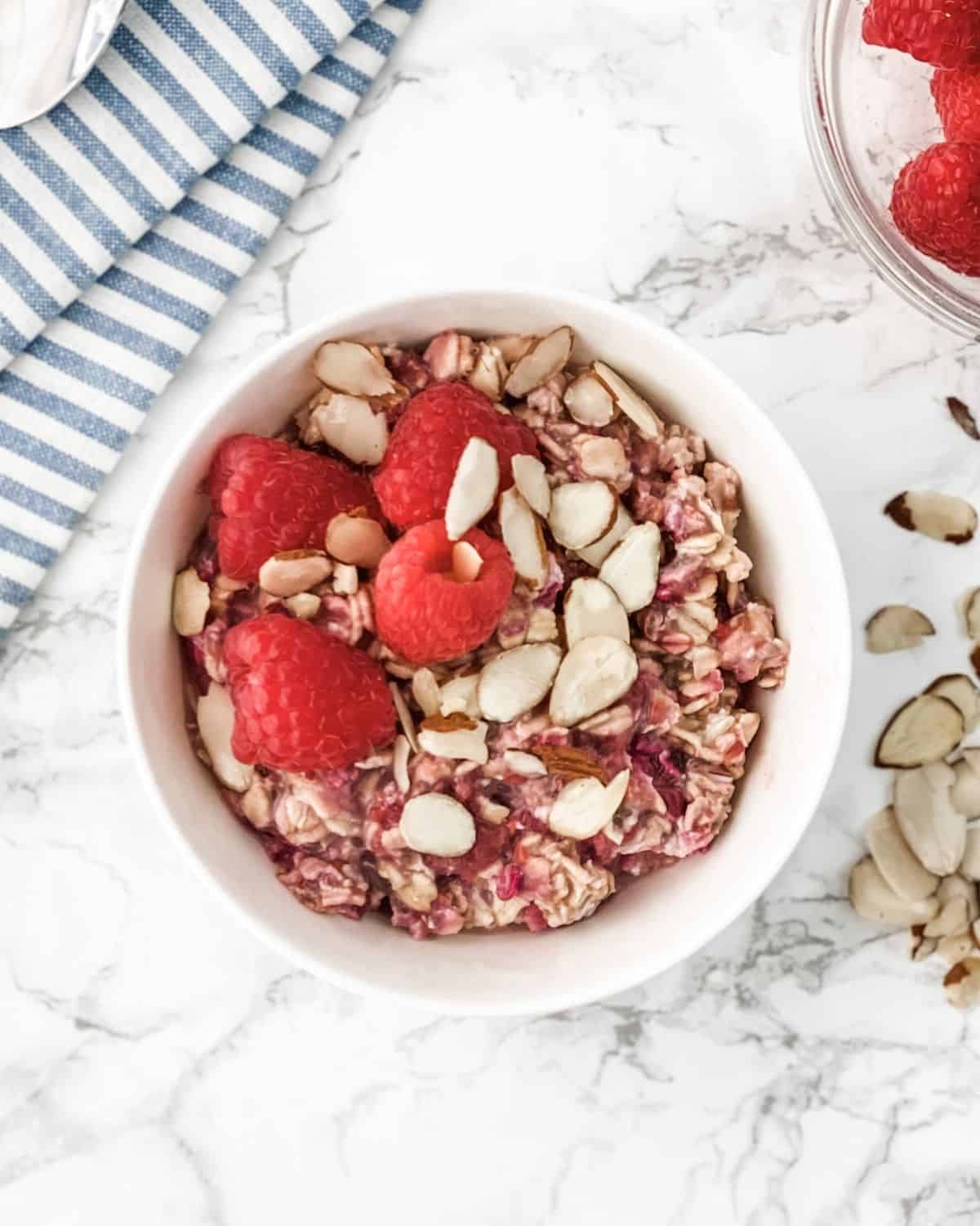 overhead picture of raspberry overnight oats.