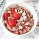 raspberry overnight oats in a white bowl