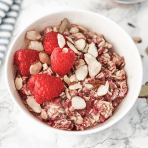 raspberry overnight oats in a white bowl