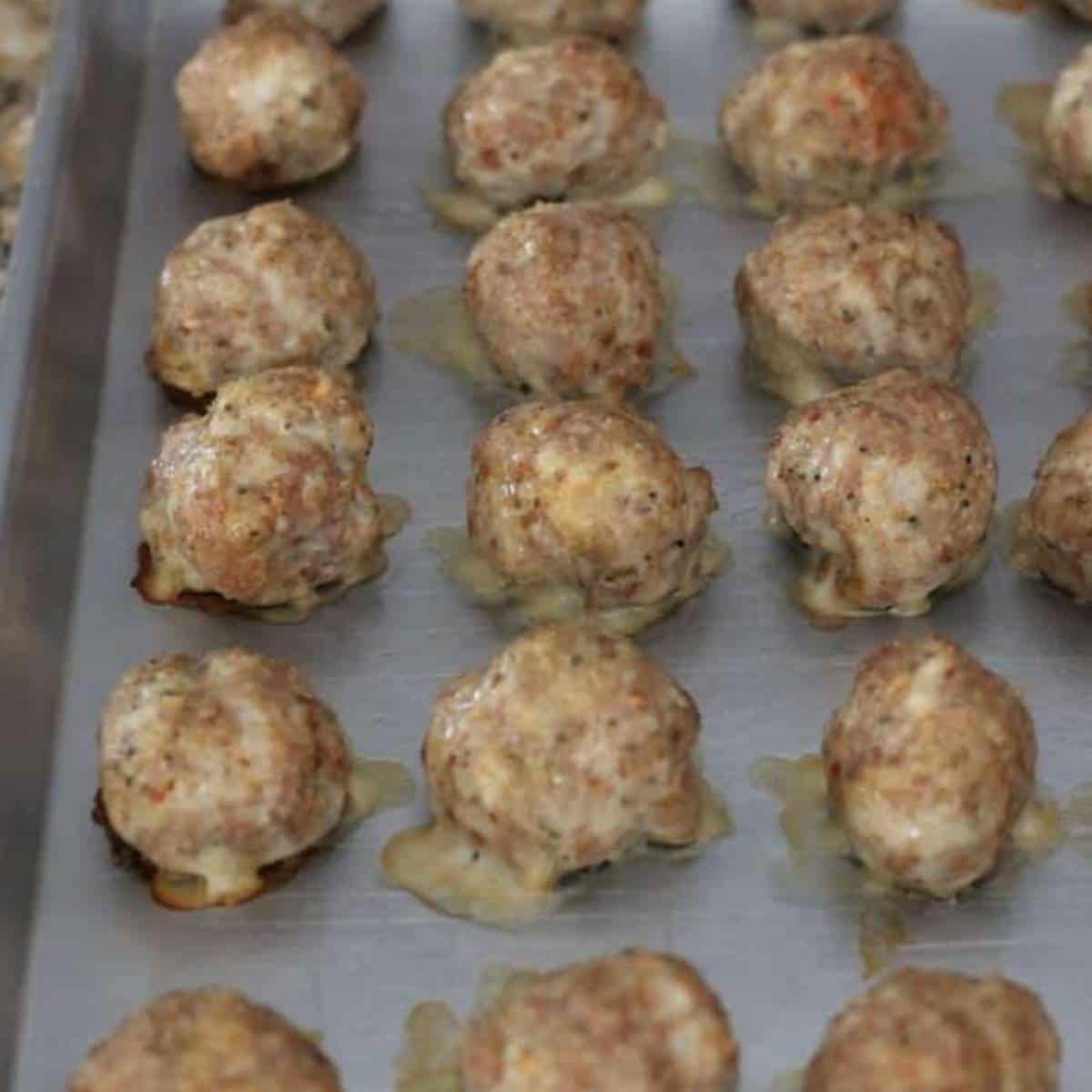 turkey meatballs baked on a sheet pan.