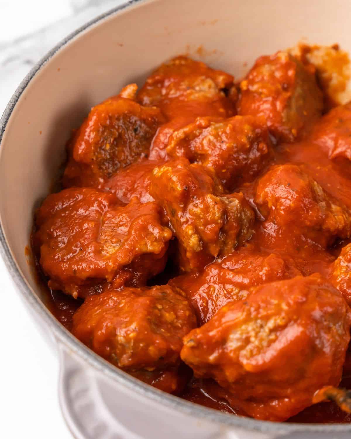 turkey meatball in sauce in a pot.