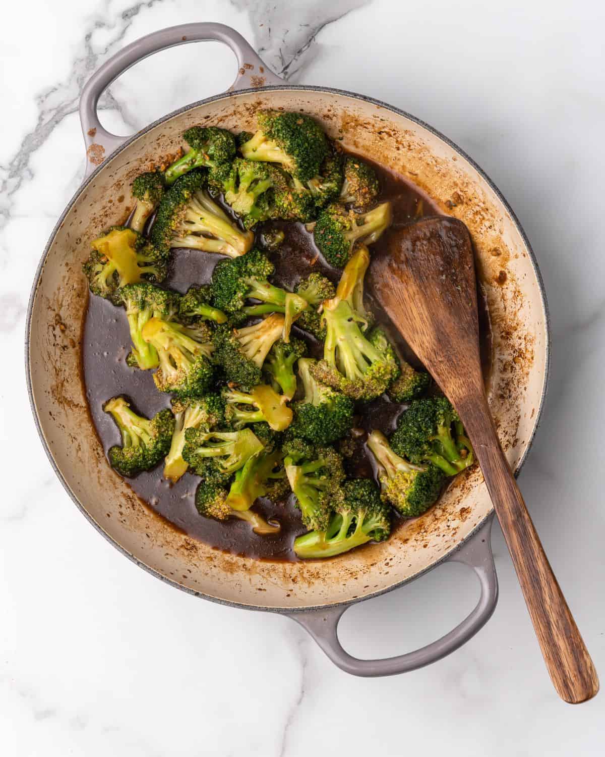 stir fry sauce and slurry mixed in with the broccoli.