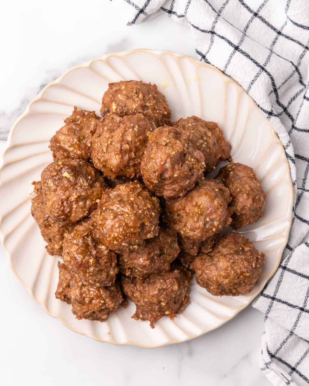 turkey meatballs without sauce on a plate.