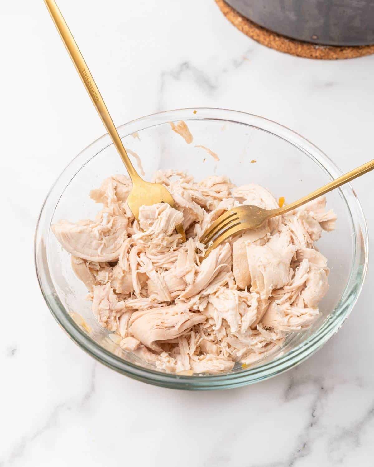 Chicken shredded in a bowl