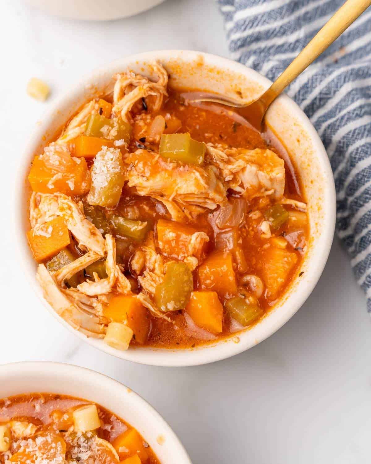 overhead of chicken soup in bowls