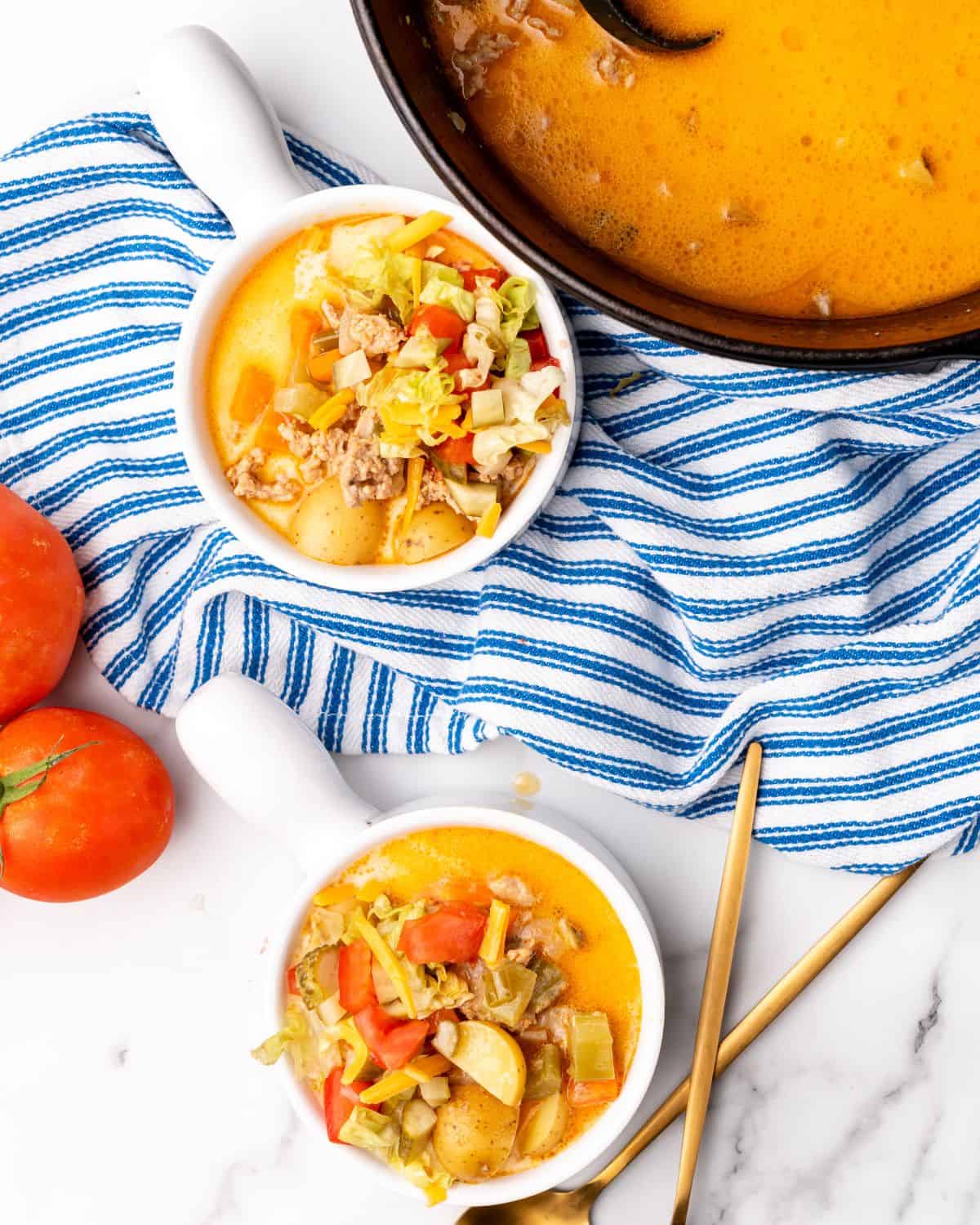 overhead view of cheeseburger soup in bowls.