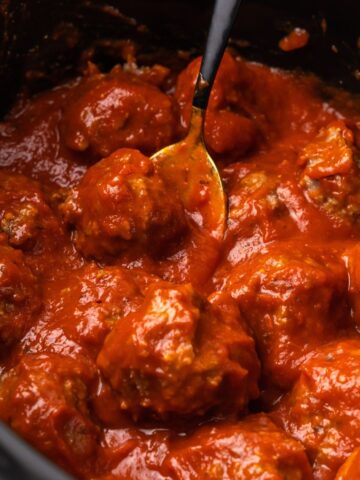 slow cooker meatballs in a crock pot.