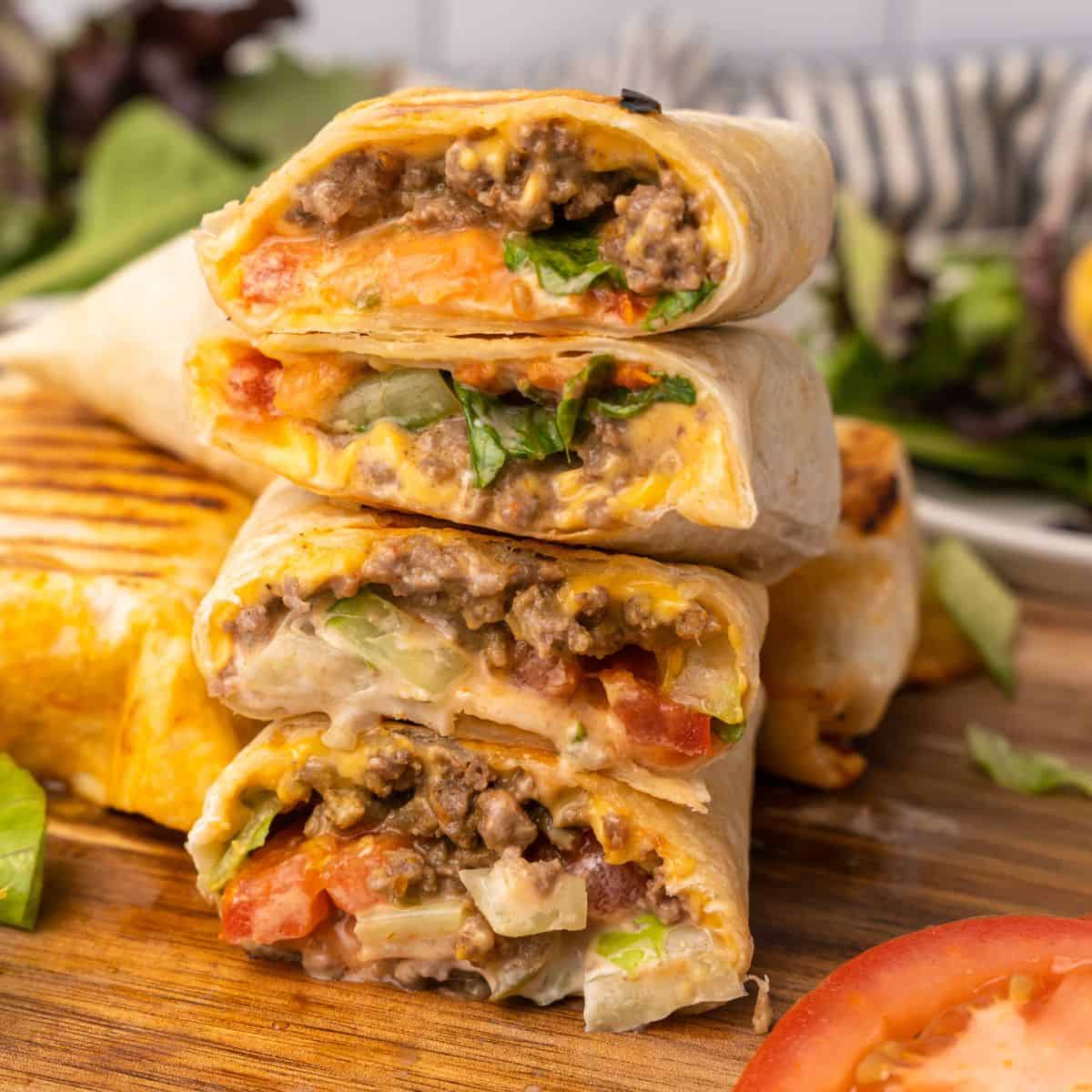 cheeseburger wraps stacked on top of one another.