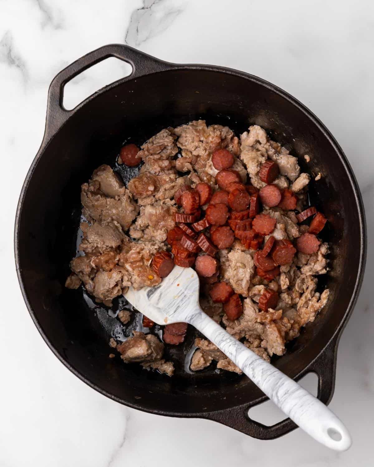 pepperoni stirred into the pot with the sausage.