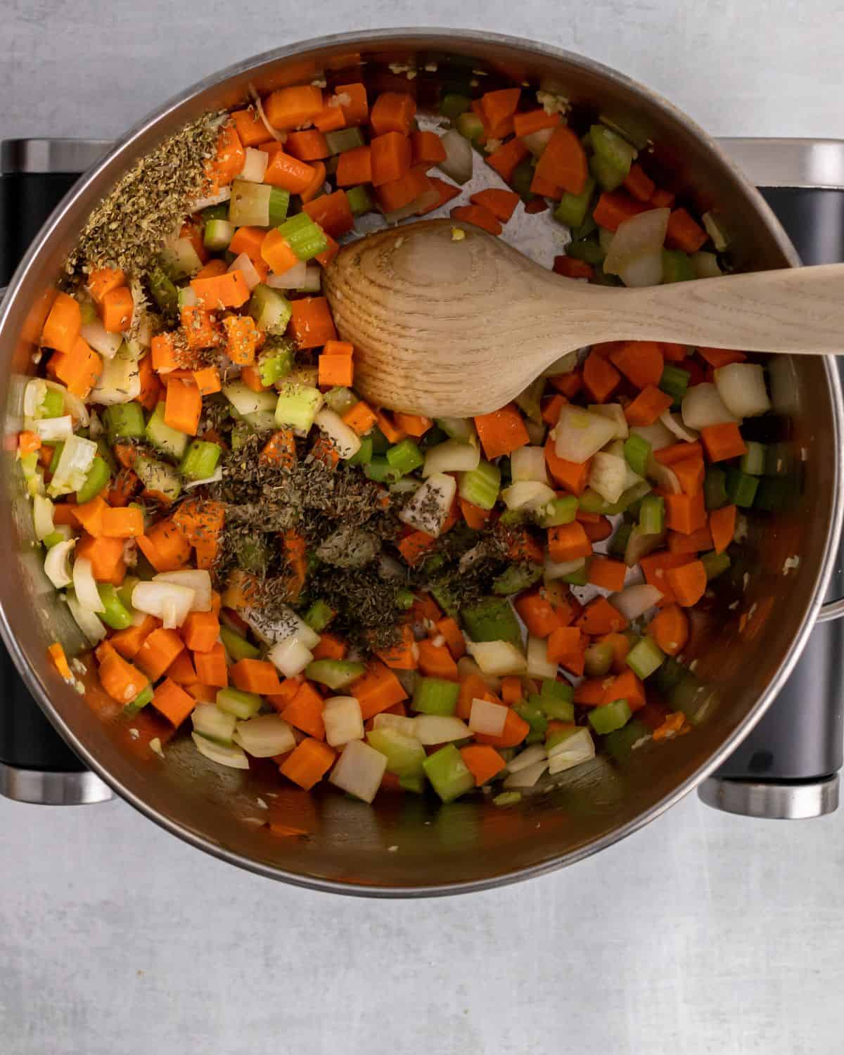 seasoning in with cooked vegetables.