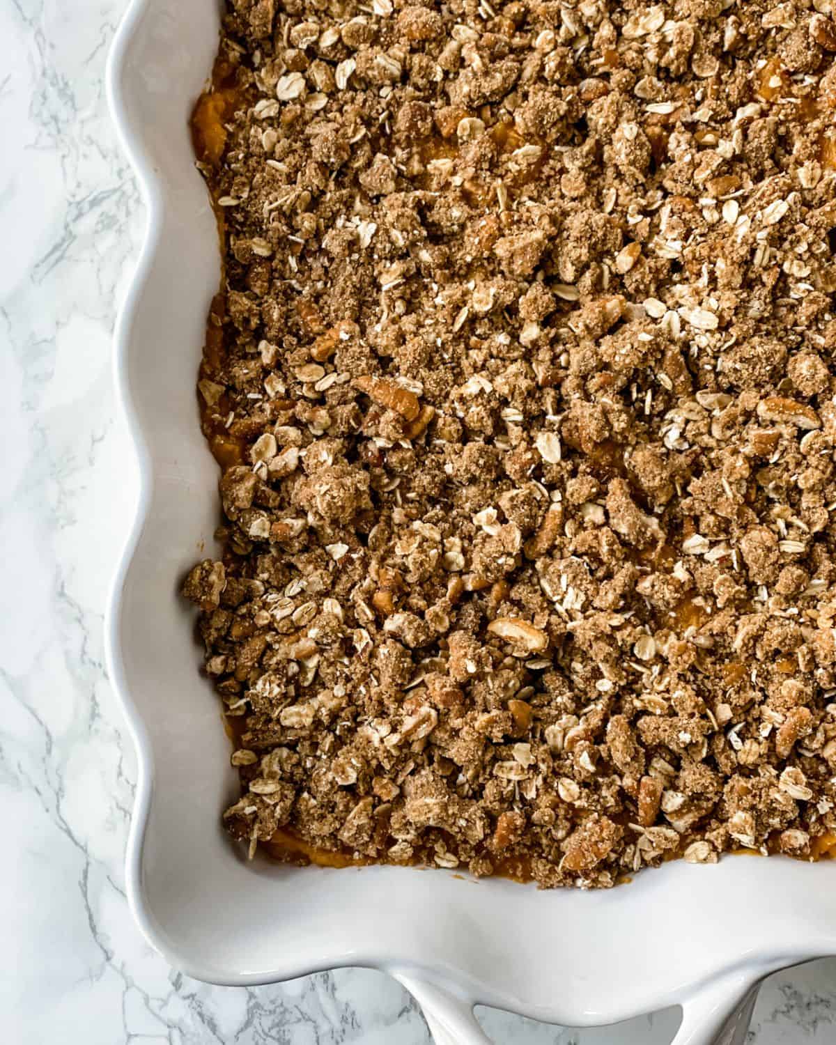 crumble topping uncooked on the sweet potato casserole.