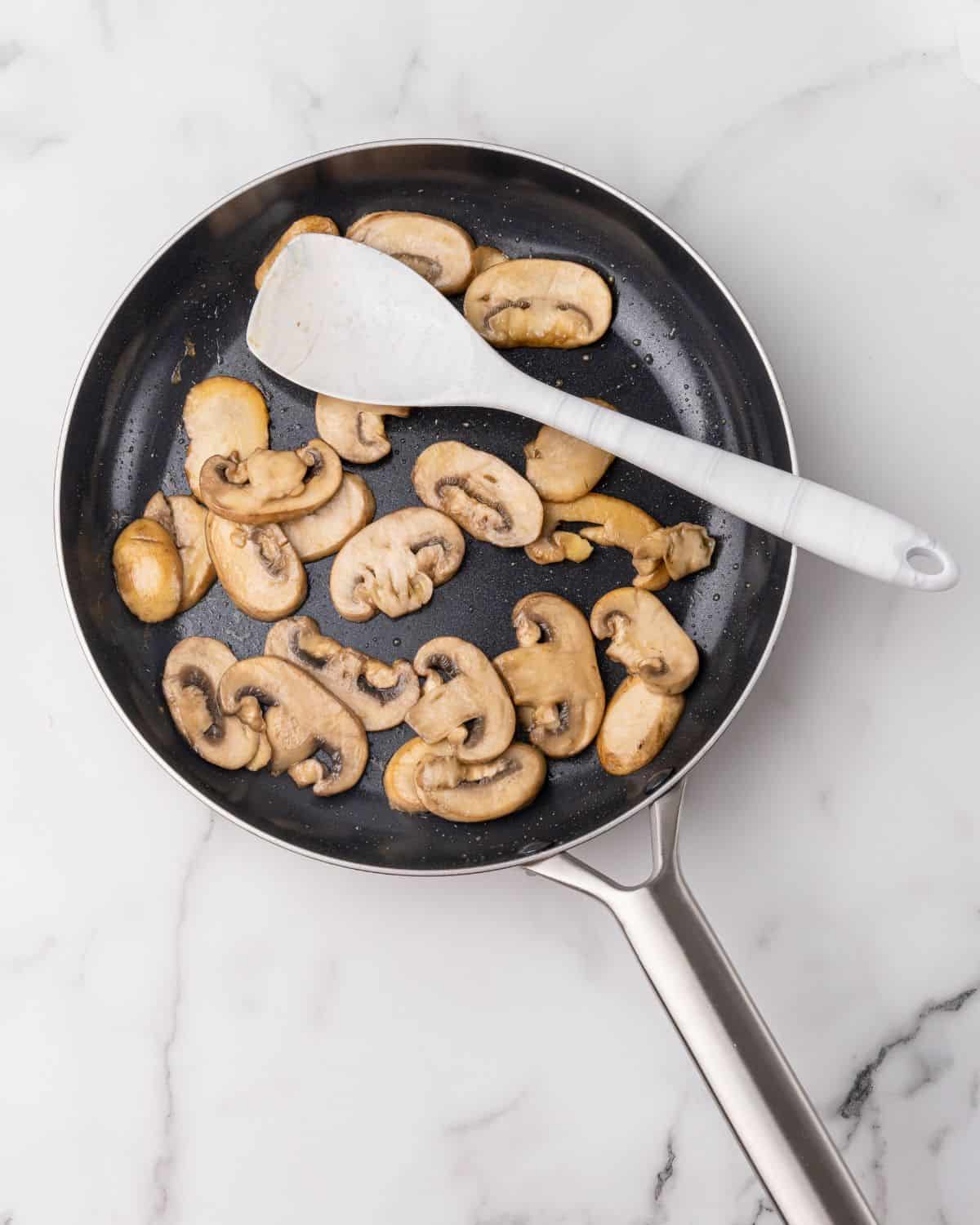 cook mushrooms in a pan