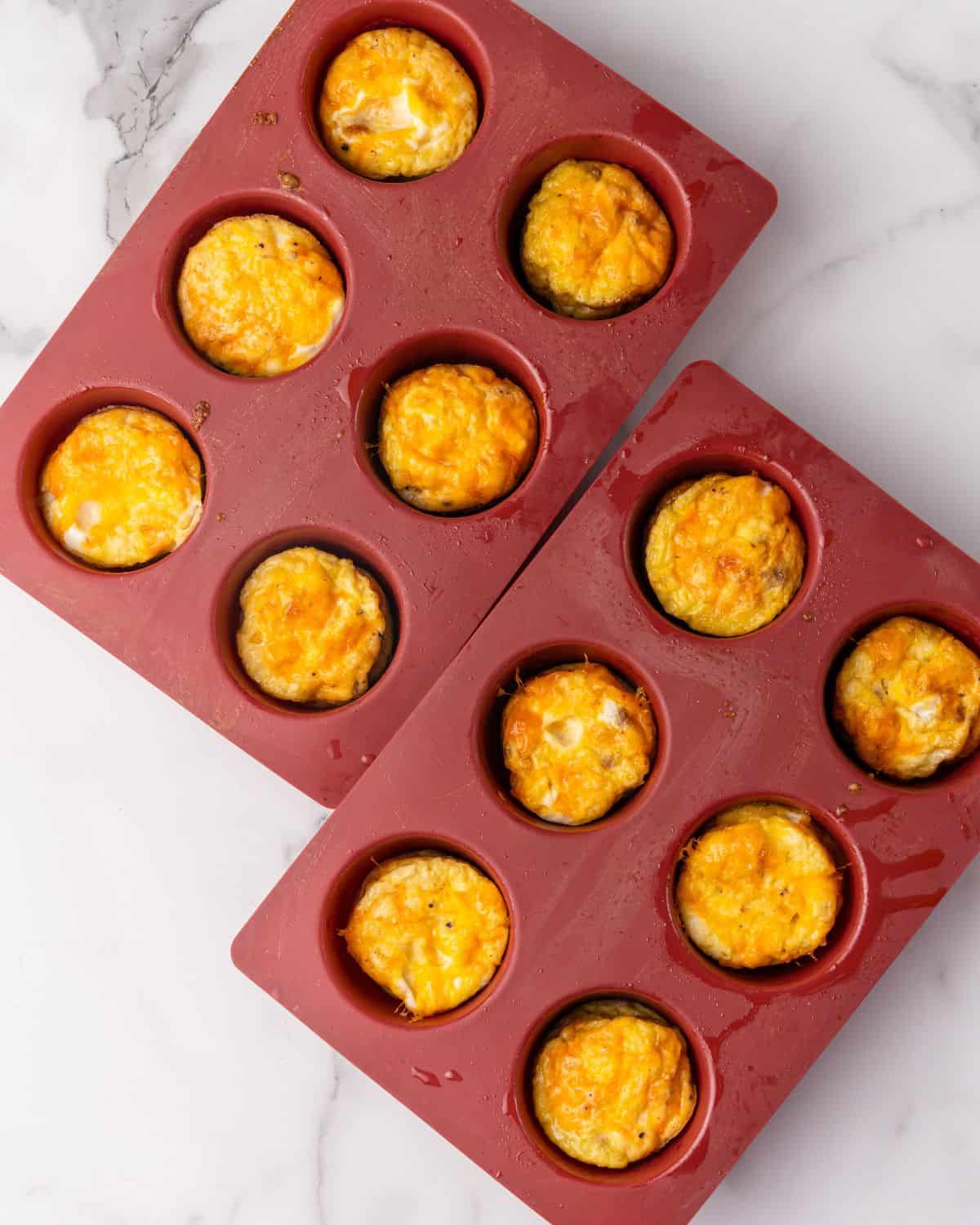 Sausage egg cups cooked in a silicone pan.