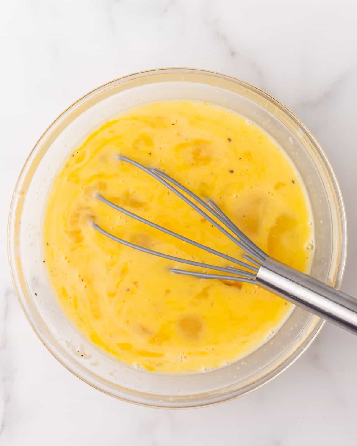 egg mixture in a glass bowl.