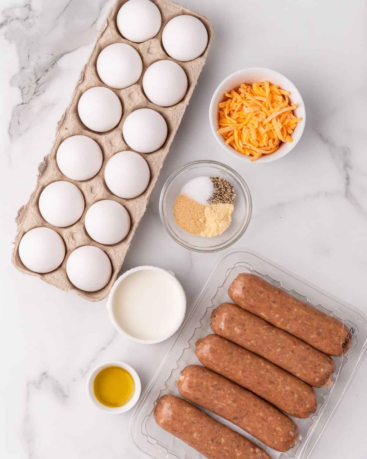 ingredients to make egg sausage muffins.