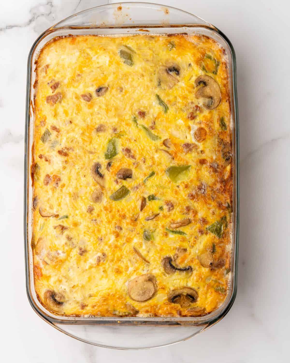 over head picture of the make-ahead sausage hashbrown casserole cooked.