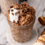 Healthy chocolate overnight oats with yogurt, protein, and fiber in a glass jar. Perfect for quick,.