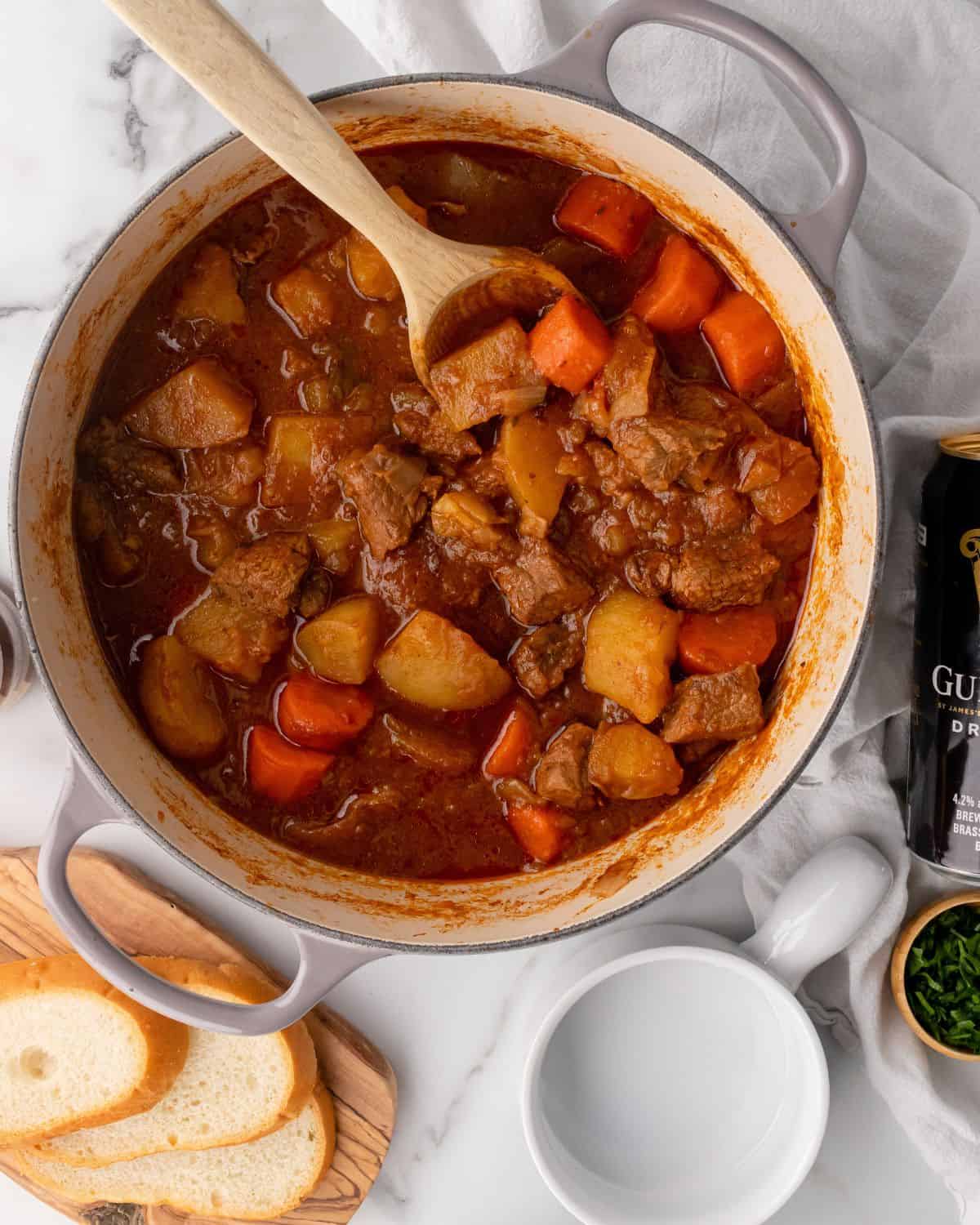 cooked down the Guinness stew and stir with a spoon. Cristy bread on the side.