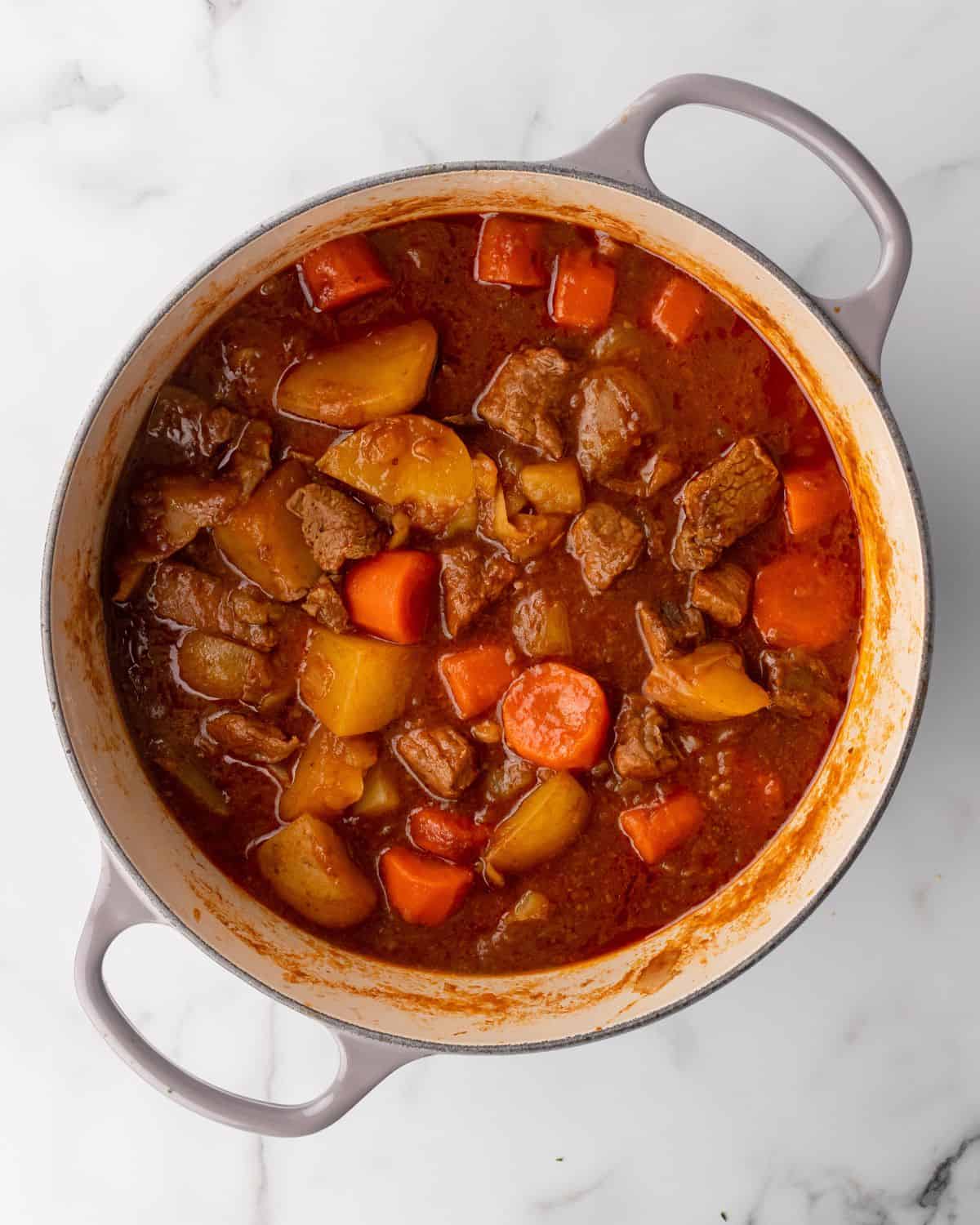 beef stew cooked down in the dutch oven.