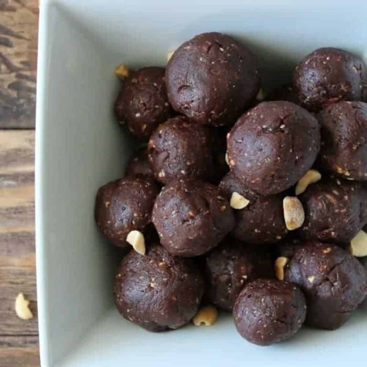 chocolate peanut butter balls in a bowl.