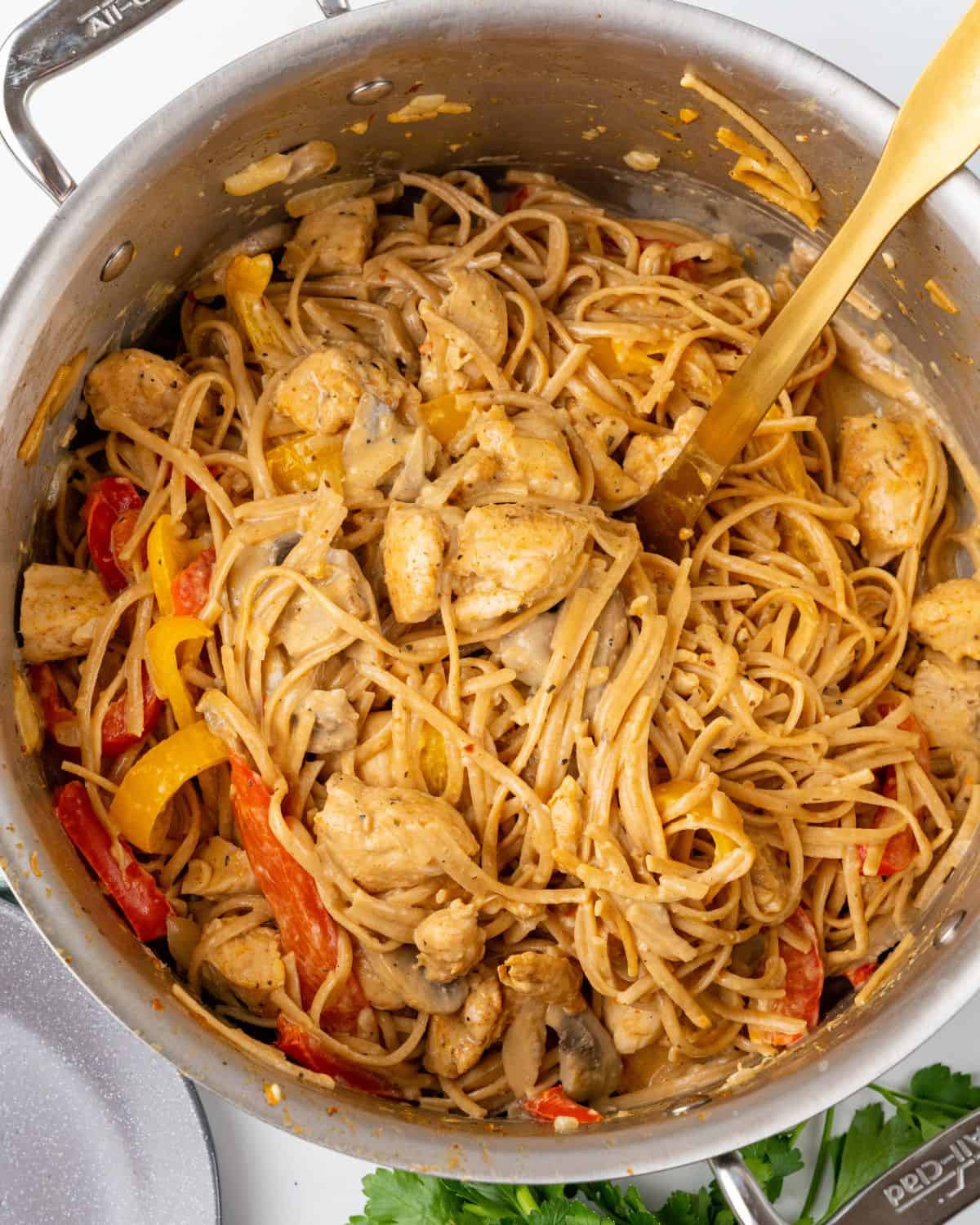 cajun chicken pasta mixed into a bowl.