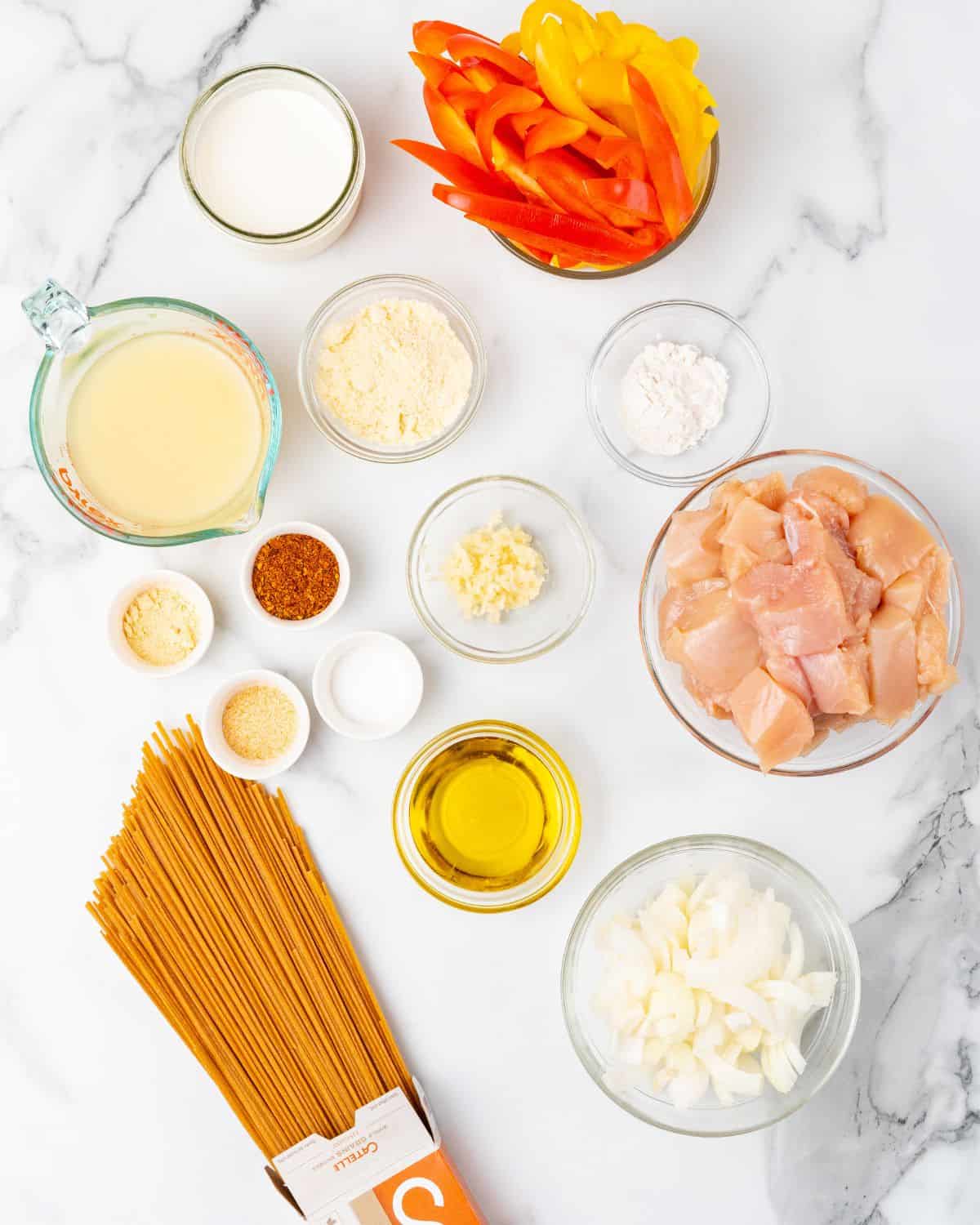 ingredients to make cajun chicken pasta.