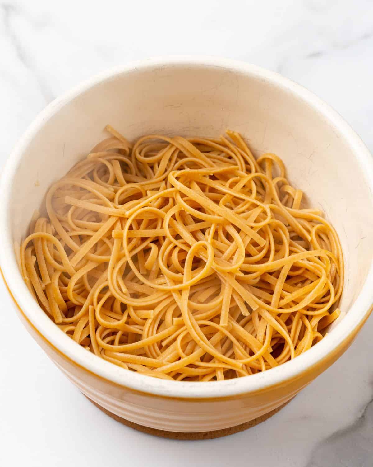 strain pasta in the colander. 