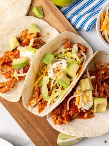 overhead picture of slow cooker shredded chicken tacos.