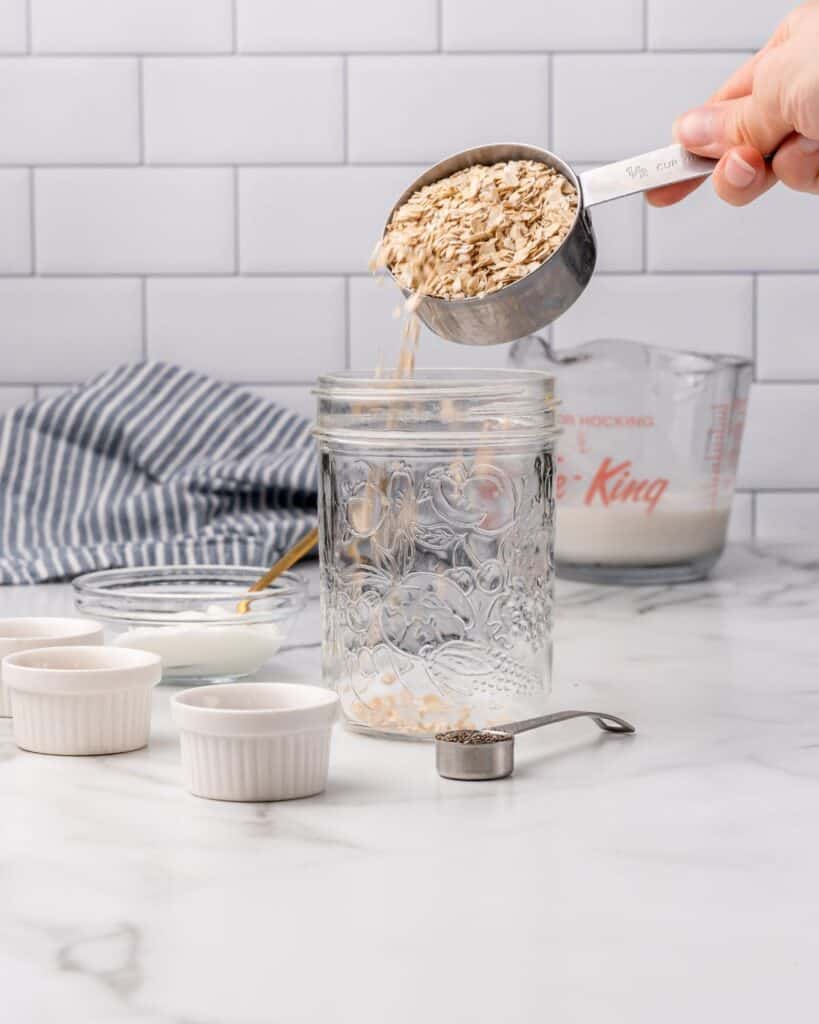 add rolled oats to jar.