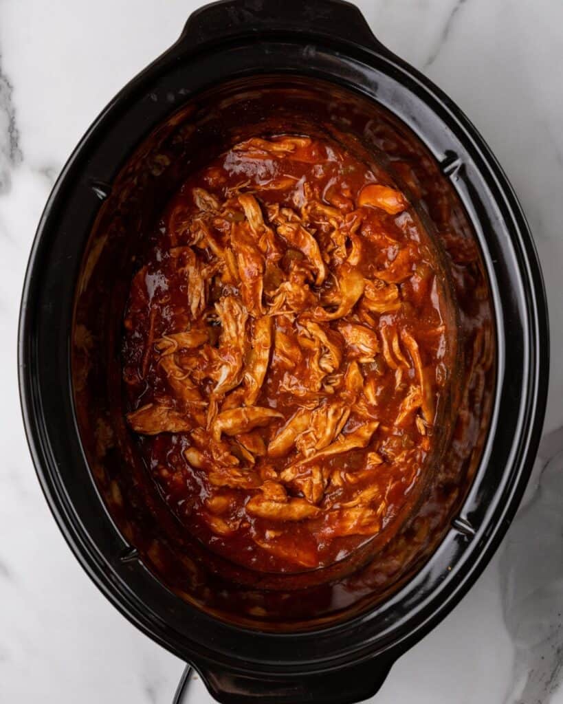 chicken shredded in the slow cooker.