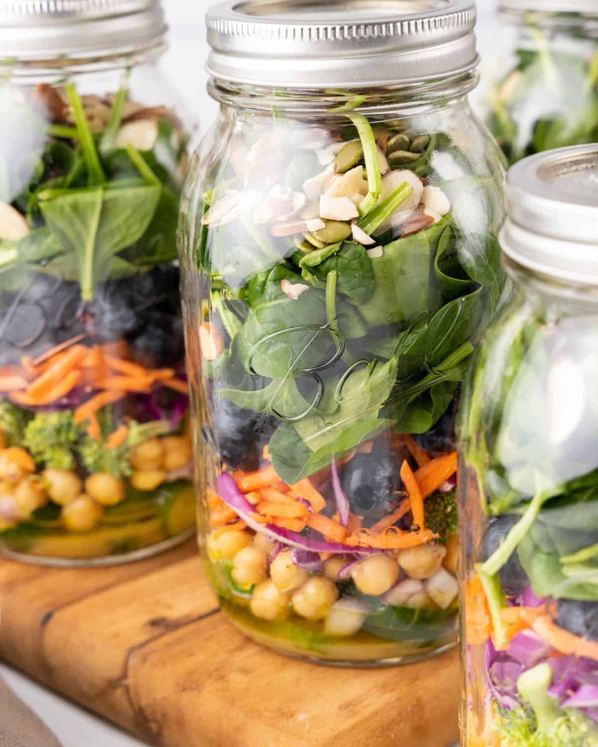 close-up view of detox salad in a jar.