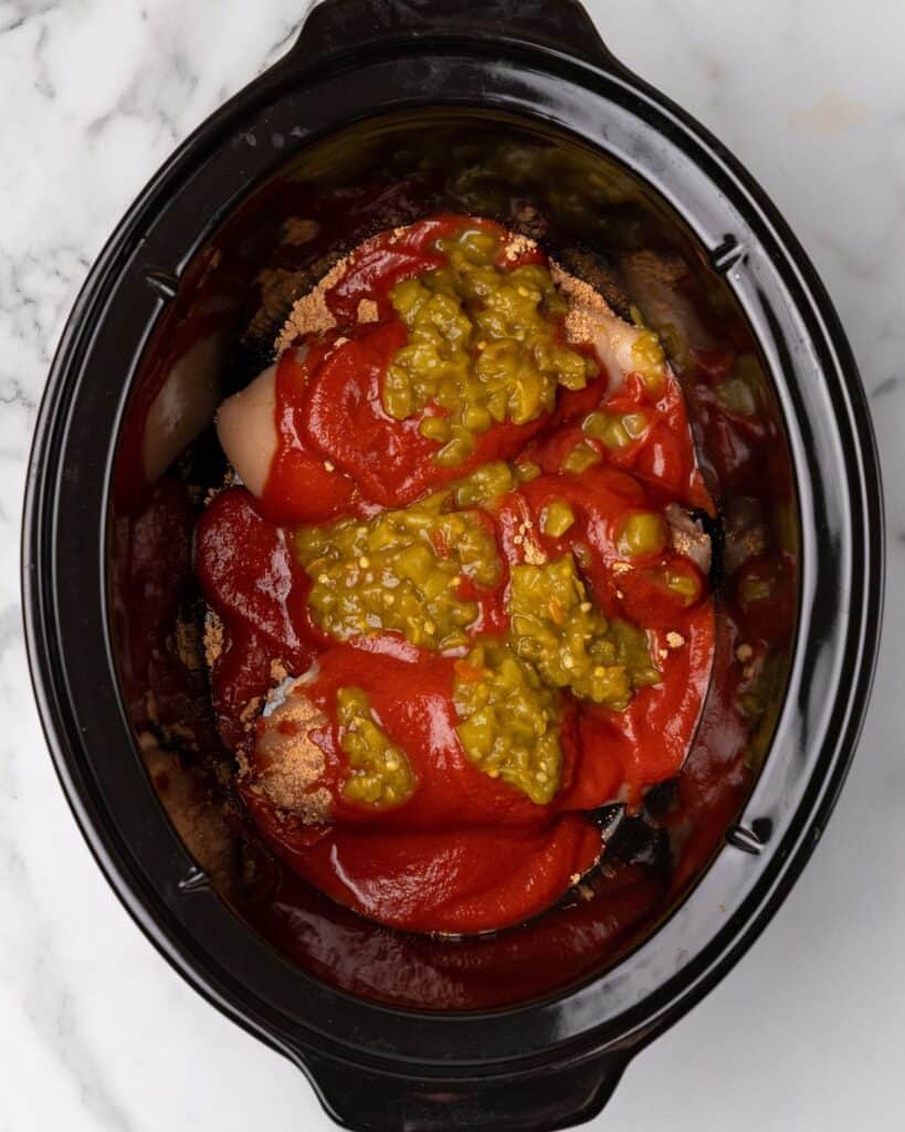 tomato sauce and canned green chiles in the crockpot.