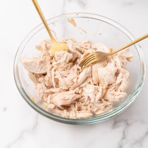 shredded chicken in a bowl.