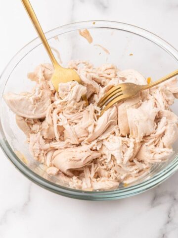 shredded chicken in a bowl.